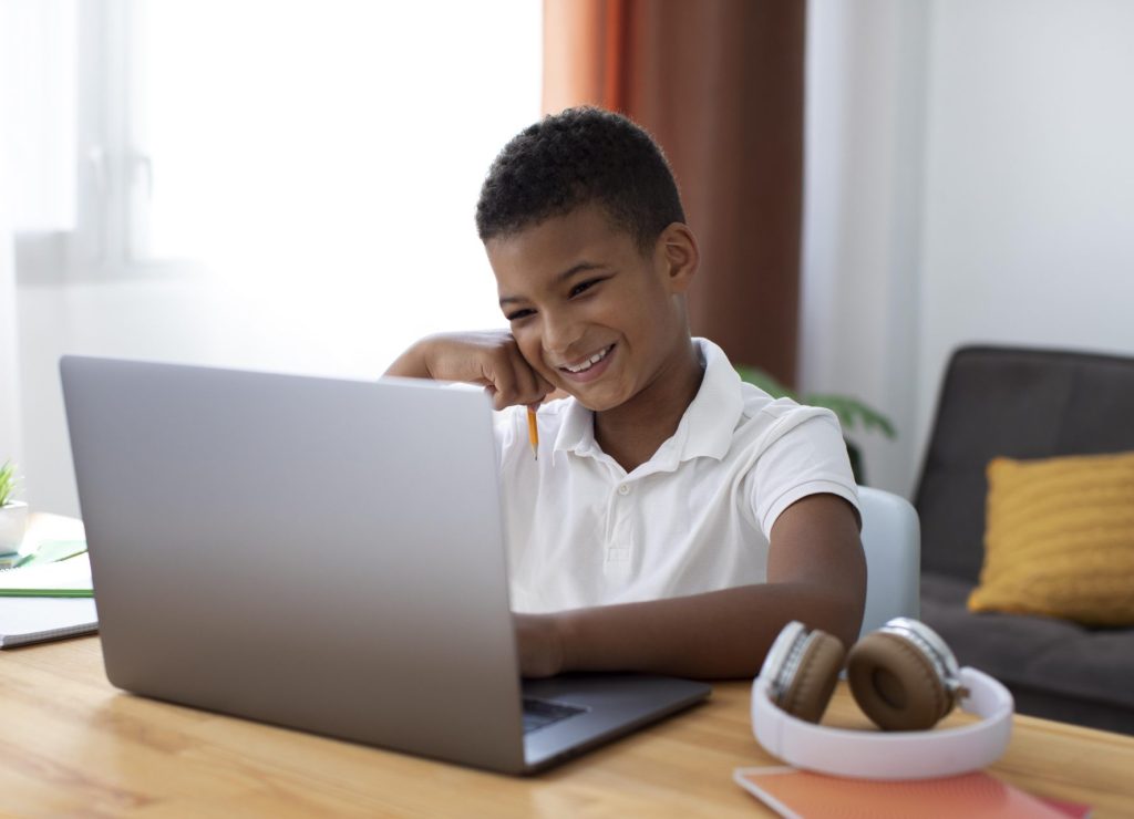little-boy-doing-school-online
